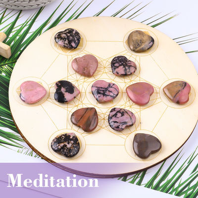 Kristal berbentuk jantung Rhodonite untuk menyeimbangkan chakra
