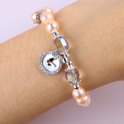 7mm Pink Pearl Stretch Bracelet Dengan Shell Putih Terima kustomisasi