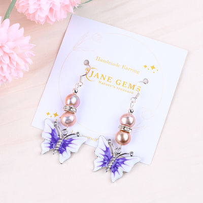9MM Ungu Baroque Air Tawar Mutiara Earrings Dengan Kemewahan Kupu-kupu